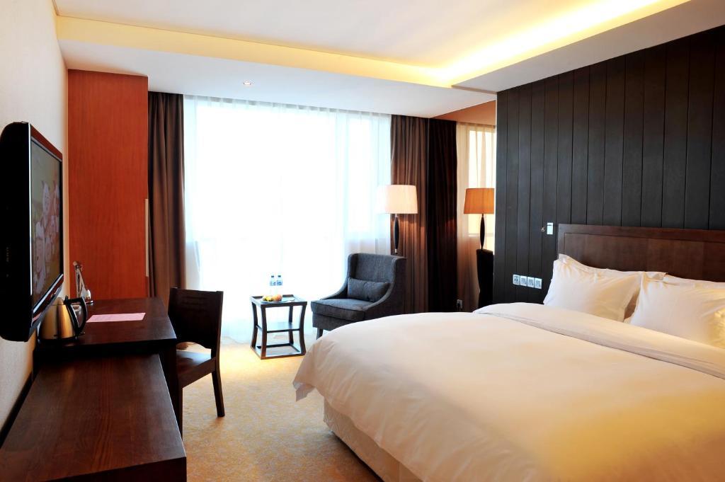 Haidu Hotel Qingdao Room photo